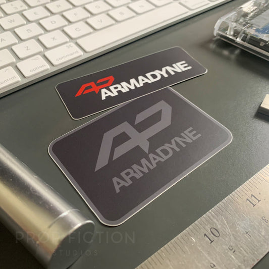 Elysium - Pair of Armadyne Computer Stickers / Set Dressing Case Decals