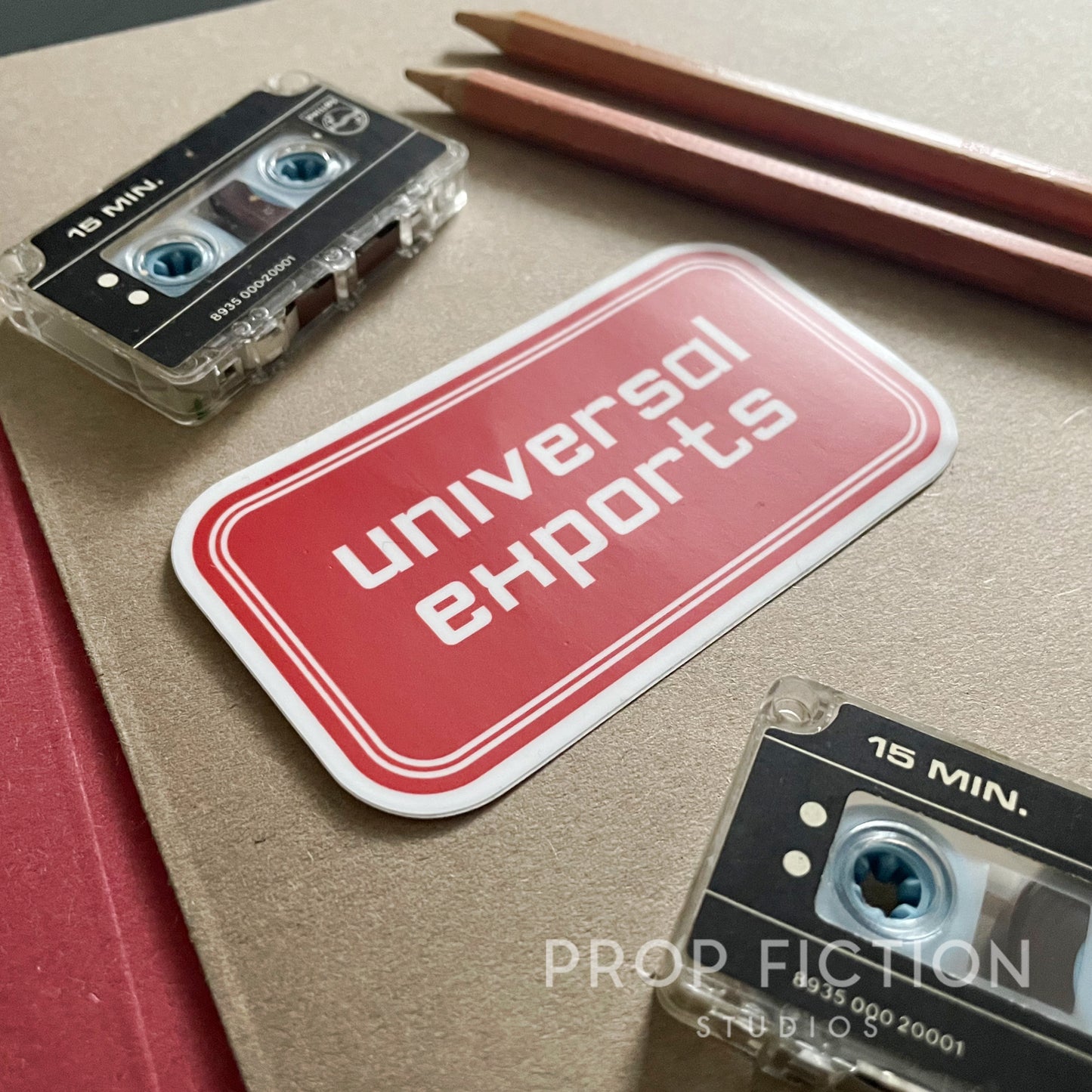 For Your Eyes Only - Prop ‘Universal Exports’ Case Sticker / UnivEx Cosplay Equipment Decal