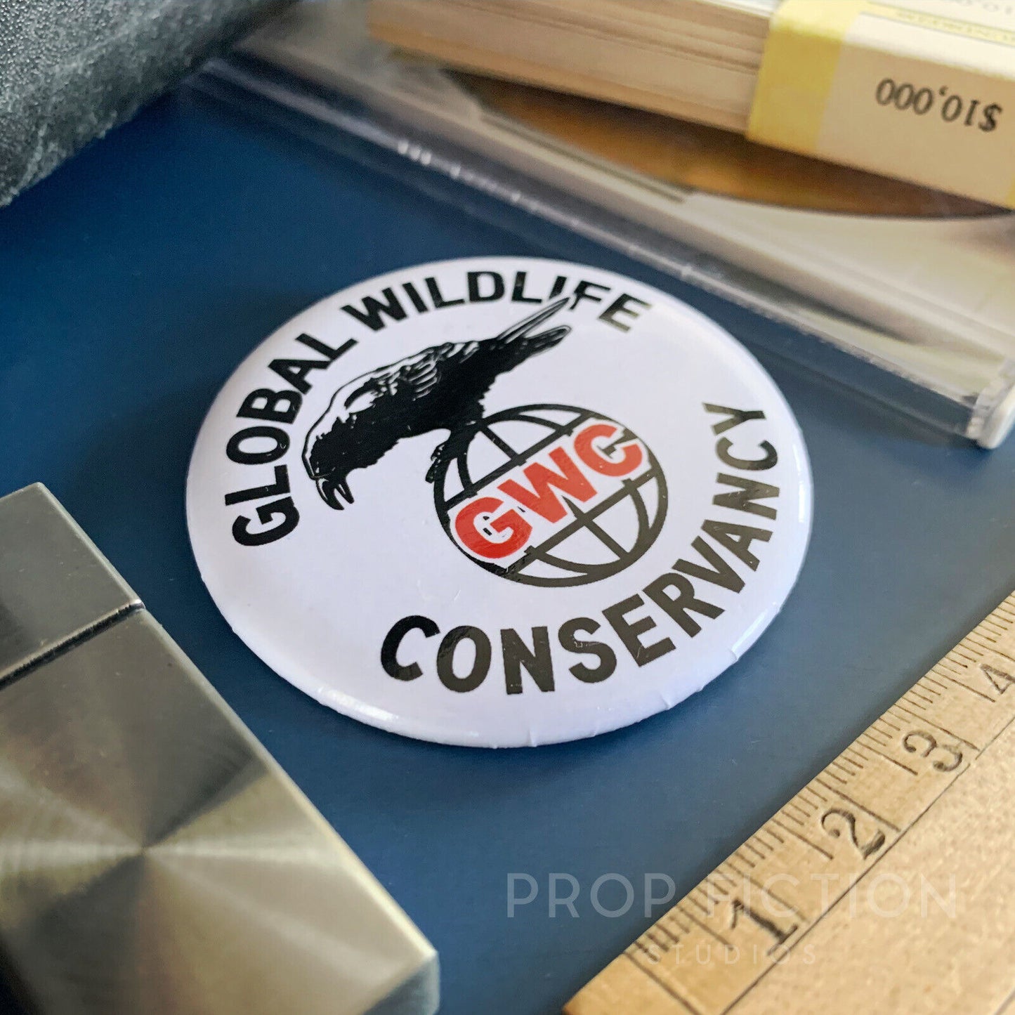 The Expendables: Prop GWC Global Wildlife Conservancy 2.25” Cosplay Button Badge